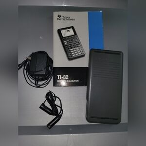 Texas Instruments TI-82 Graphing Calculator with Accessories ,  Like New